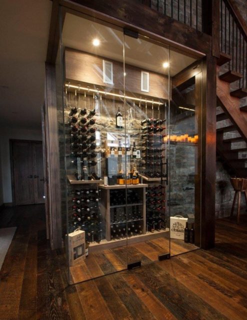 a wide-angle view of a 3 cable wine system in a beautiful wine cellar