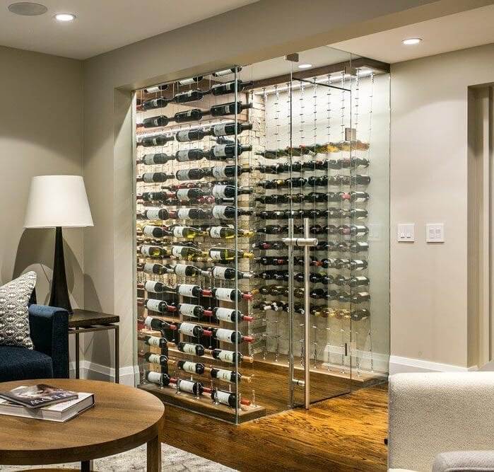 a view of a glass wine cellar with a cable wine racking system