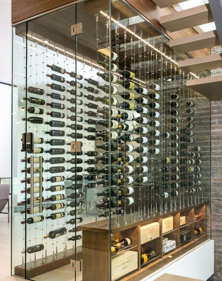 a glassy wine cellar that has a really modern look